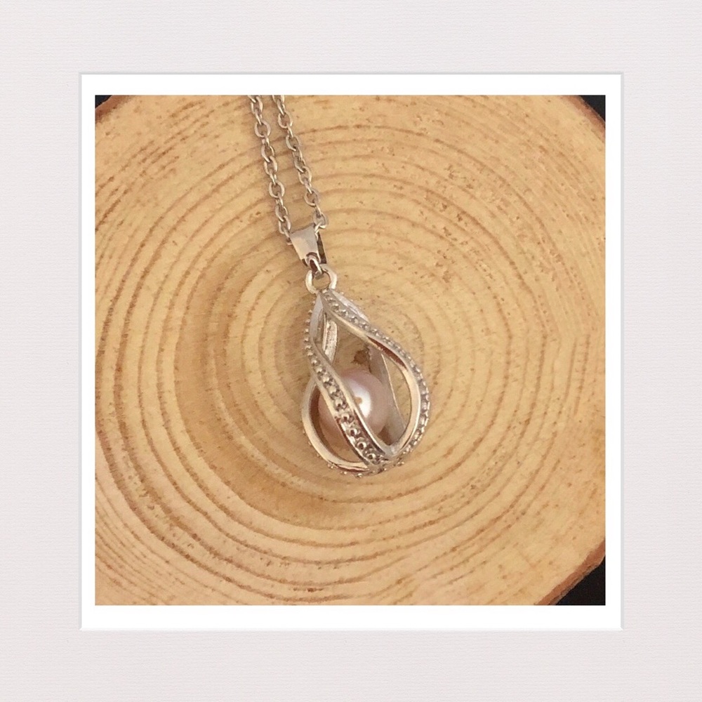 Genuine Freahwater Pearl in Caged Pendant